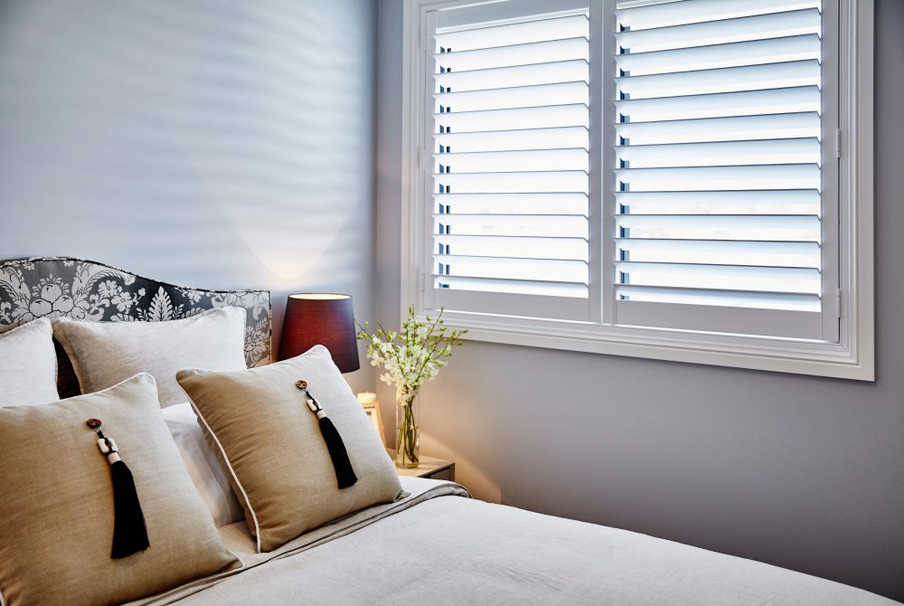 plantation shutters installed in bedroom in Central Coast, NSW