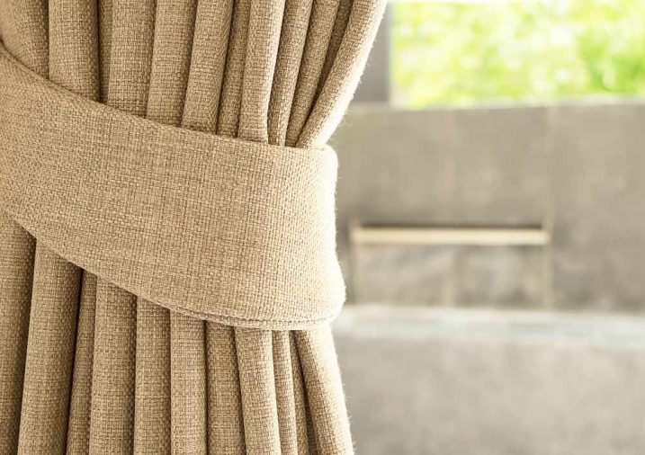 Closeup Of A Brown Curtain — Ron Ayton Curtains, Blinds & Shutters in Central Coast, NSW